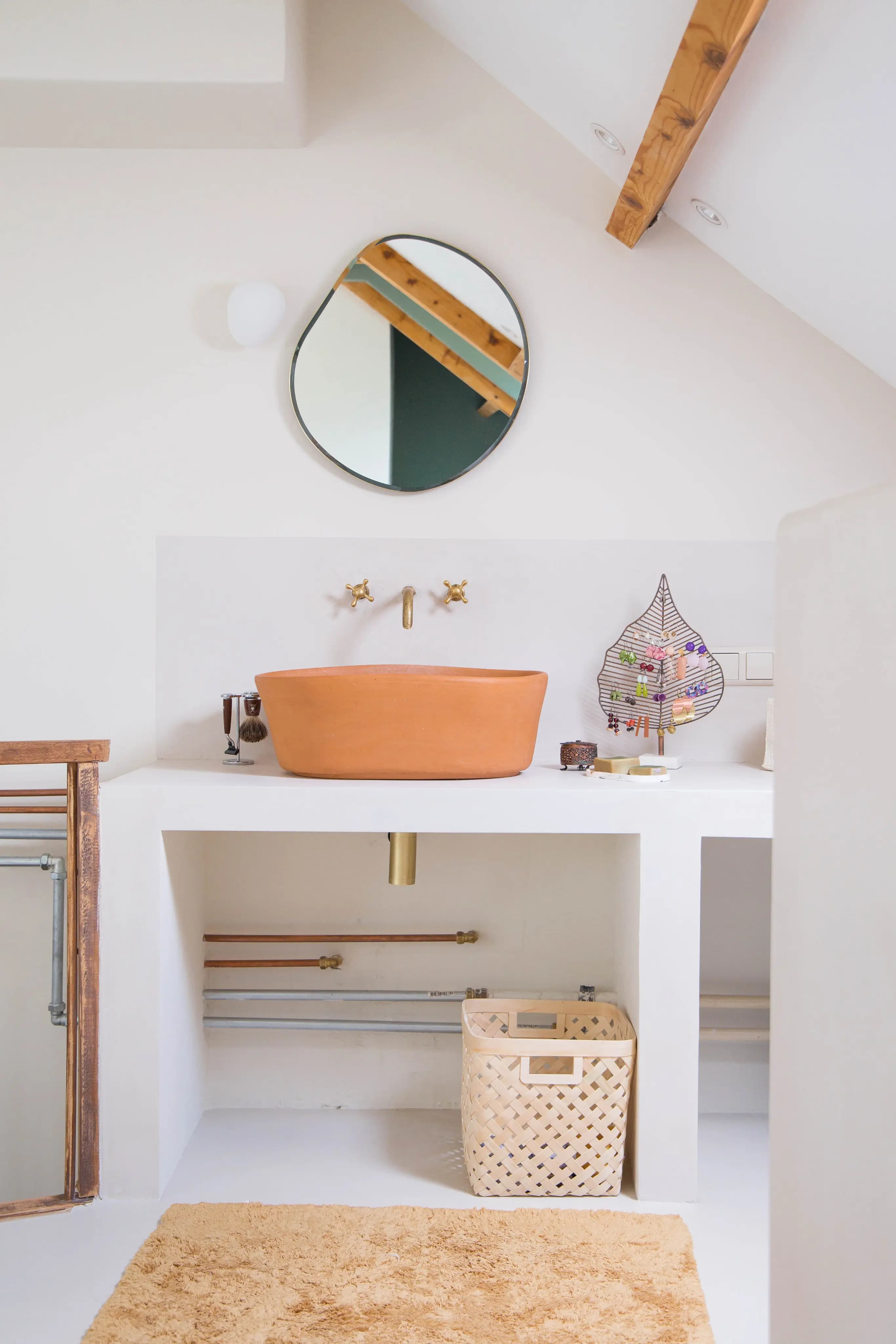Tasteful Attic transformation terracotta basin vignette